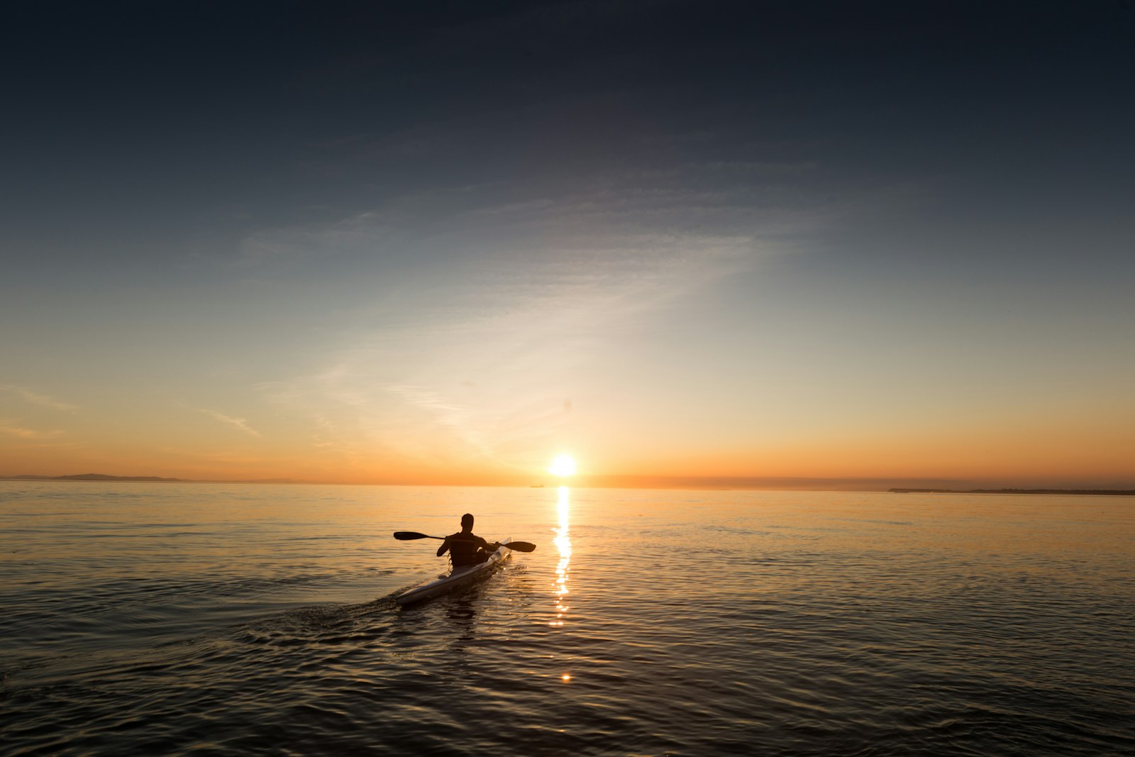 paddlers on calm water - Rivara Kayak - paddle sports gear for dealers