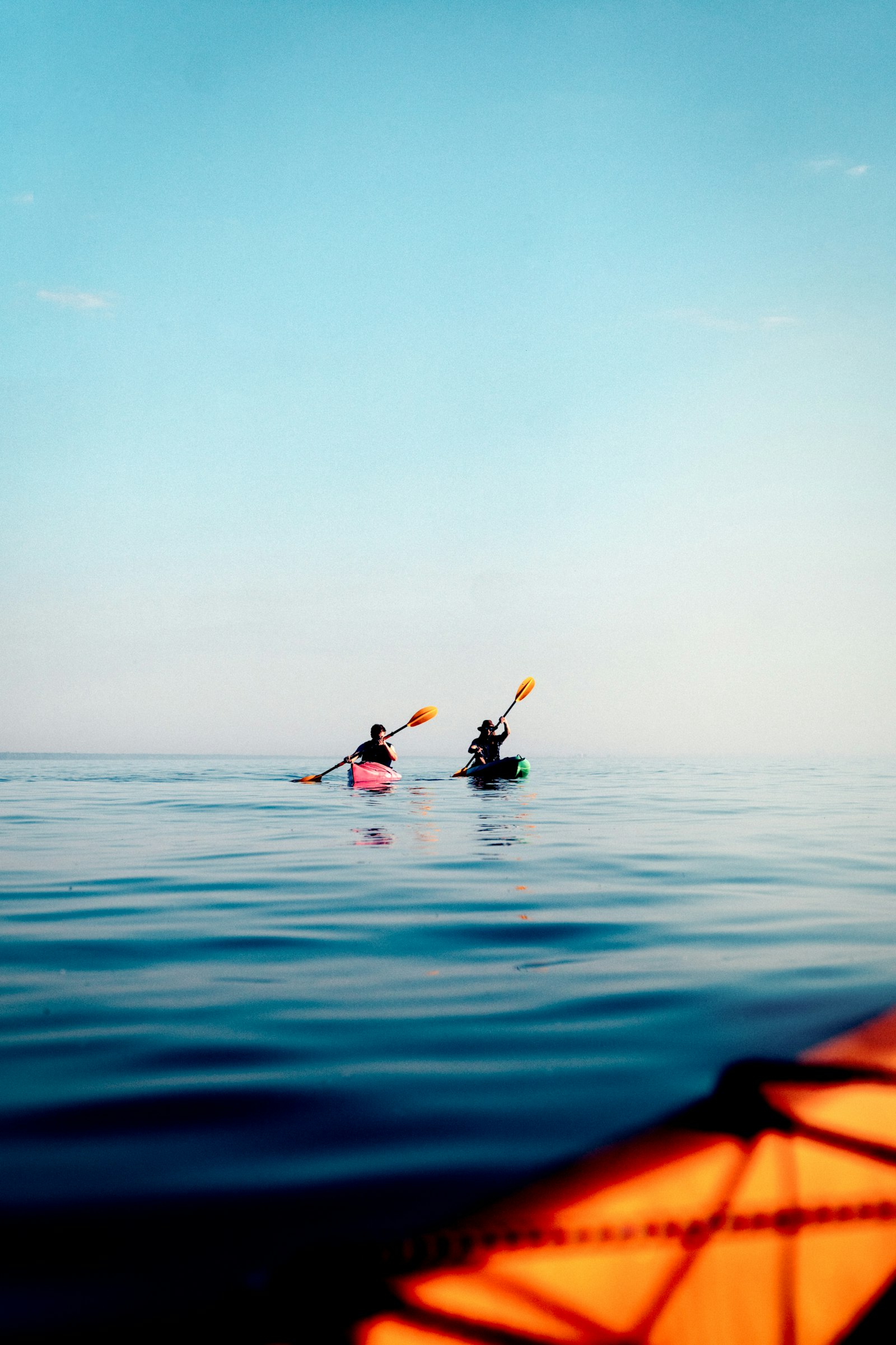 kayaker paddling on open water - Rivara Kayak - paddle sports gear for dealers